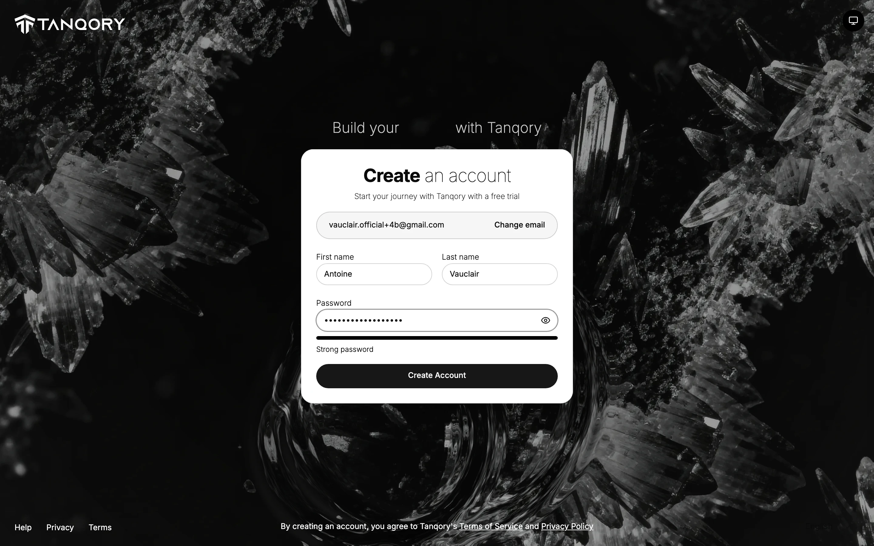 The second step: the same card now showing the email address with a Change email link beside it, First name and Last name filled in with Antoine and Vauclair, a password field with a full strength bar reading Strong password, and a Create Account button.