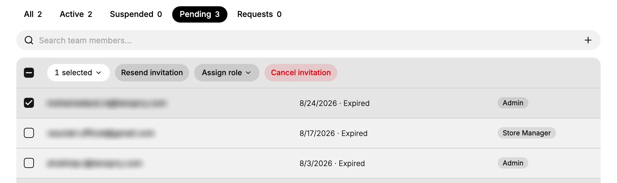 The Pending tab on the Users page, with one invitation ticked and the Resend invitation, Assign role and Cancel invitation actions showing above the list