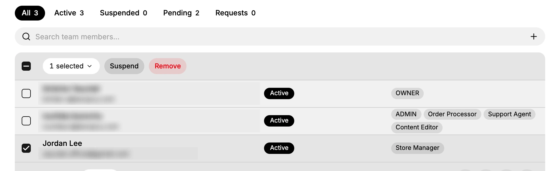 The Users page with one member row ticked, showing the Suspend and Remove actions above the list