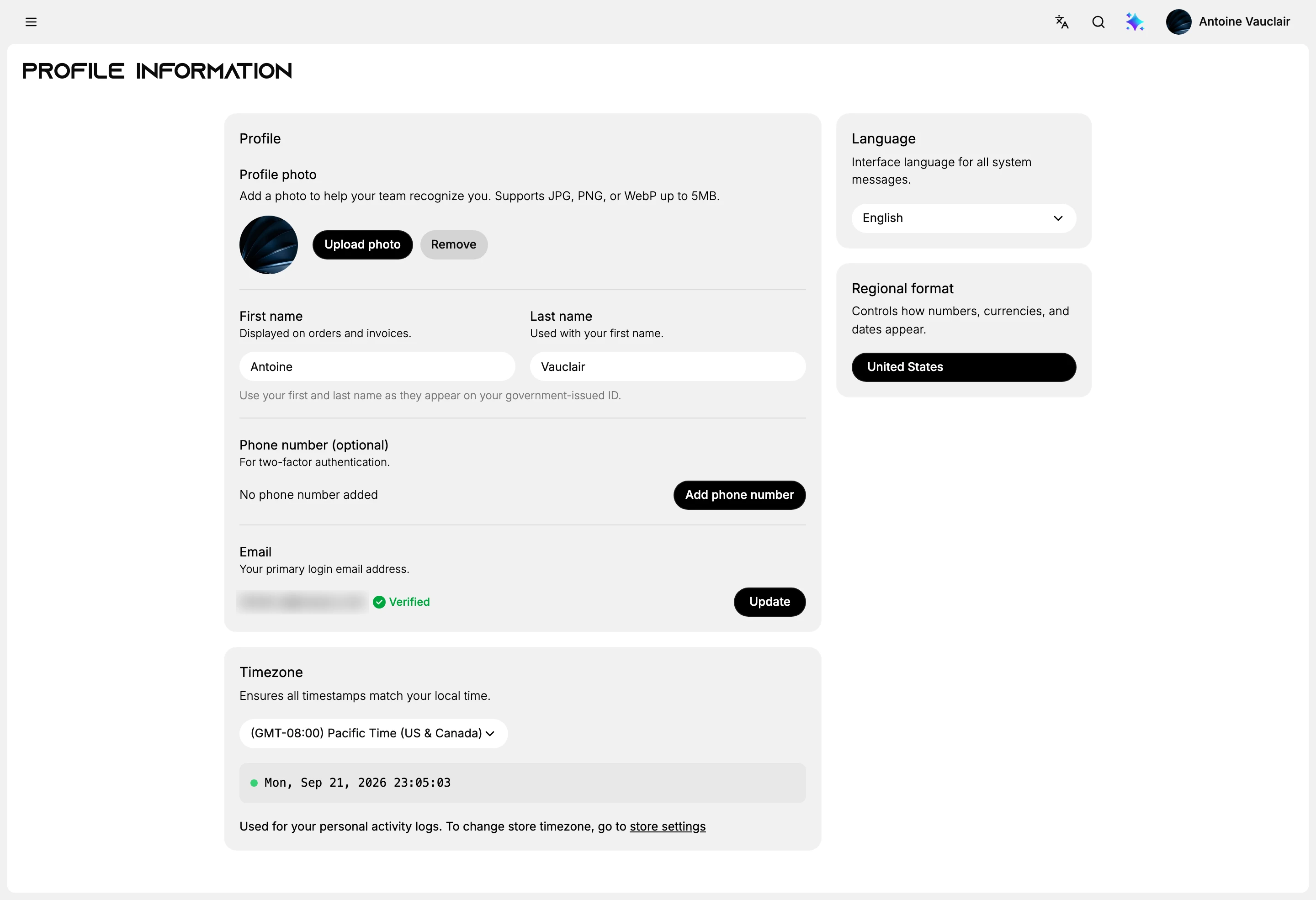 The Profile Information page, with a Profile card holding a photo, first and last name, a phone number row and the login email, a Timezone card below it showing the current time, and Language and Regional format cards down the right side