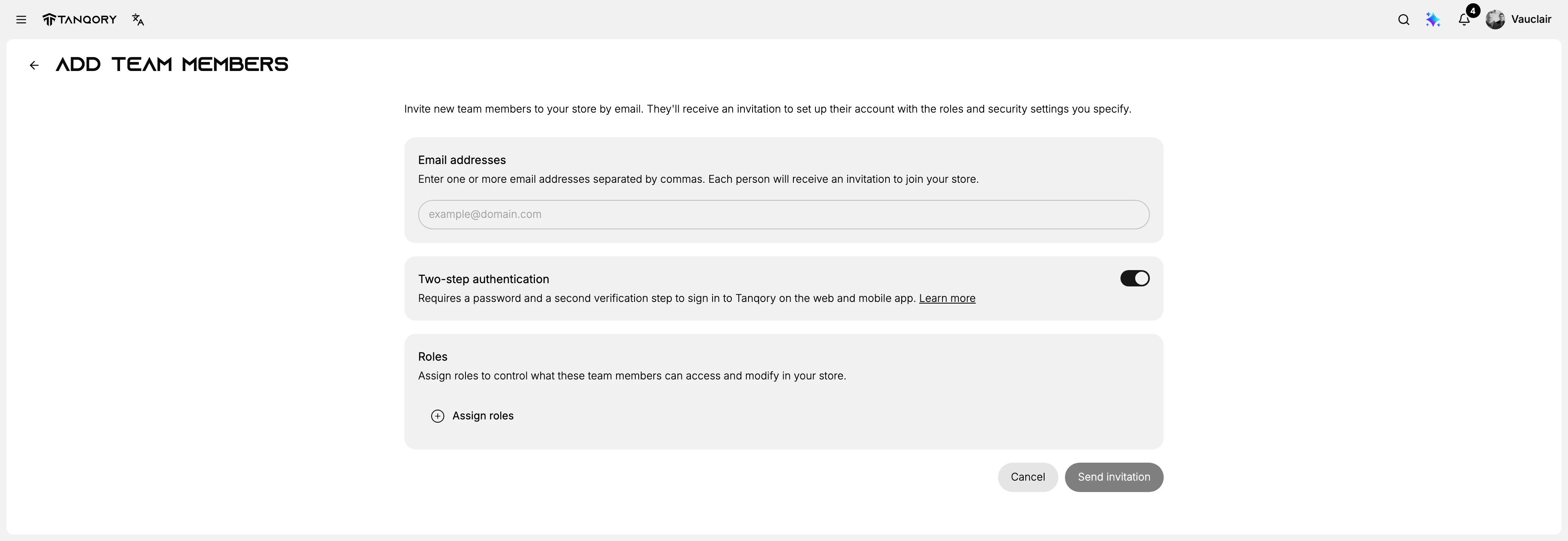 The Add team members form, with an Email addresses box at the top, the Two-step authentication card and its toggle in the middle, a Roles card with an Assign roles control below that, and Cancel and Send invitation at the foot