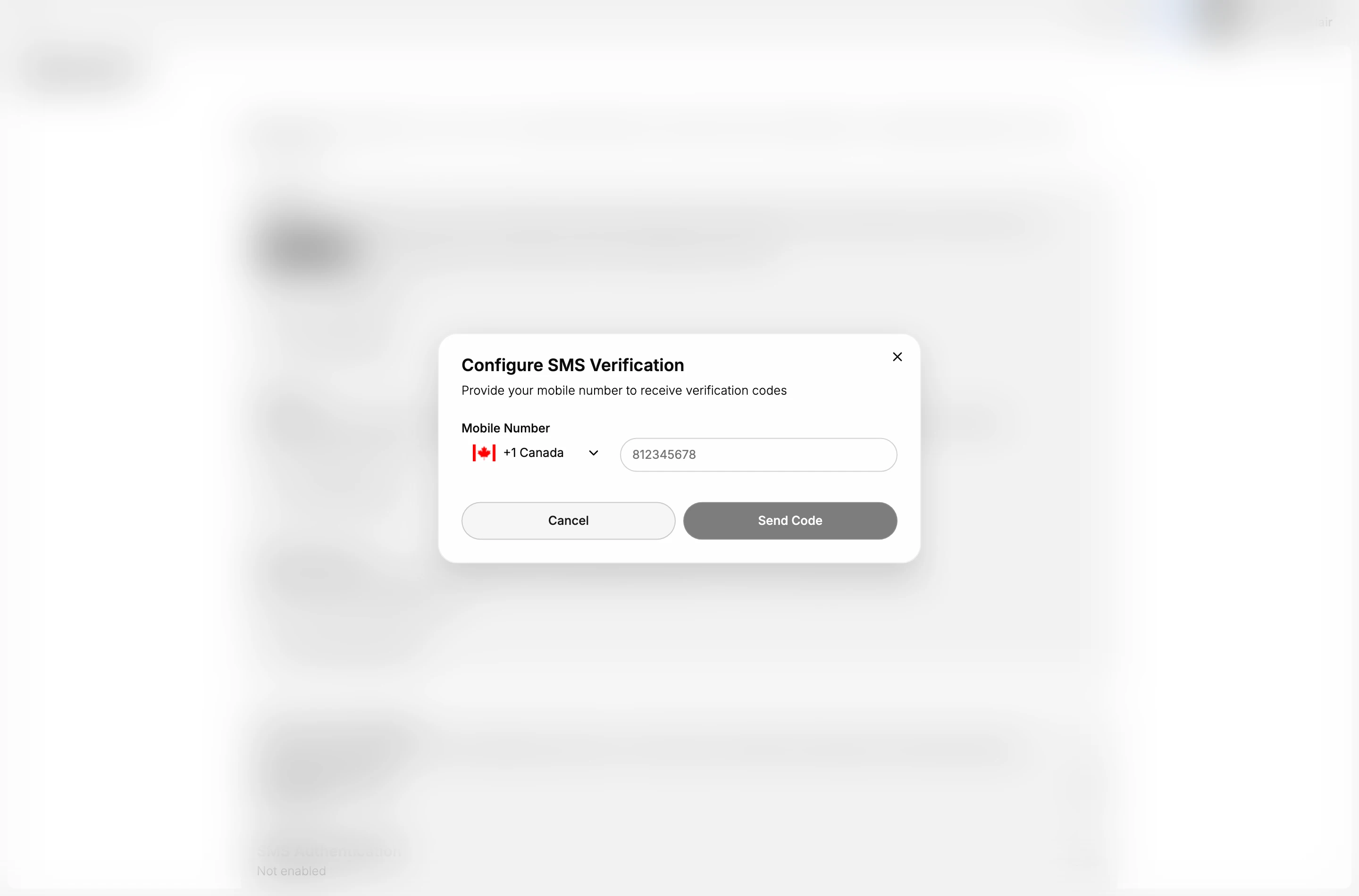 The Configure SMS Verification dialog, reading Provide your mobile number to receive verification codes, with a Mobile Number label above a country selector showing a flag and a dialling code, an empty number field beside it, and Cancel and Send Code buttons