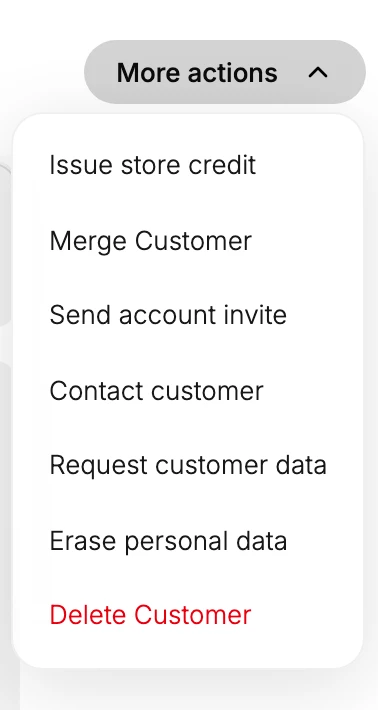 The More actions menu open on a customer record. It lists Issue store credit, Merge Customer, Send account invite, Contact customer, Request customer data, Erase personal data, and Delete Customer last and in red
