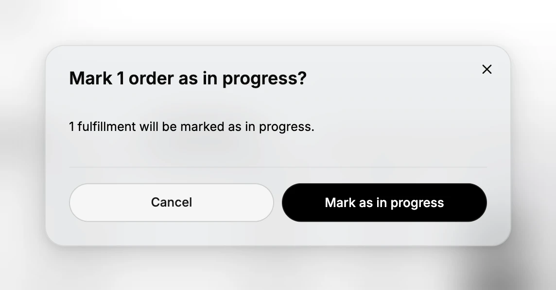 The confirmation window titled Mark 1 order as in progress, reading 1 fulfillment will be marked as in progress, with Cancel and Mark as in progress buttons.