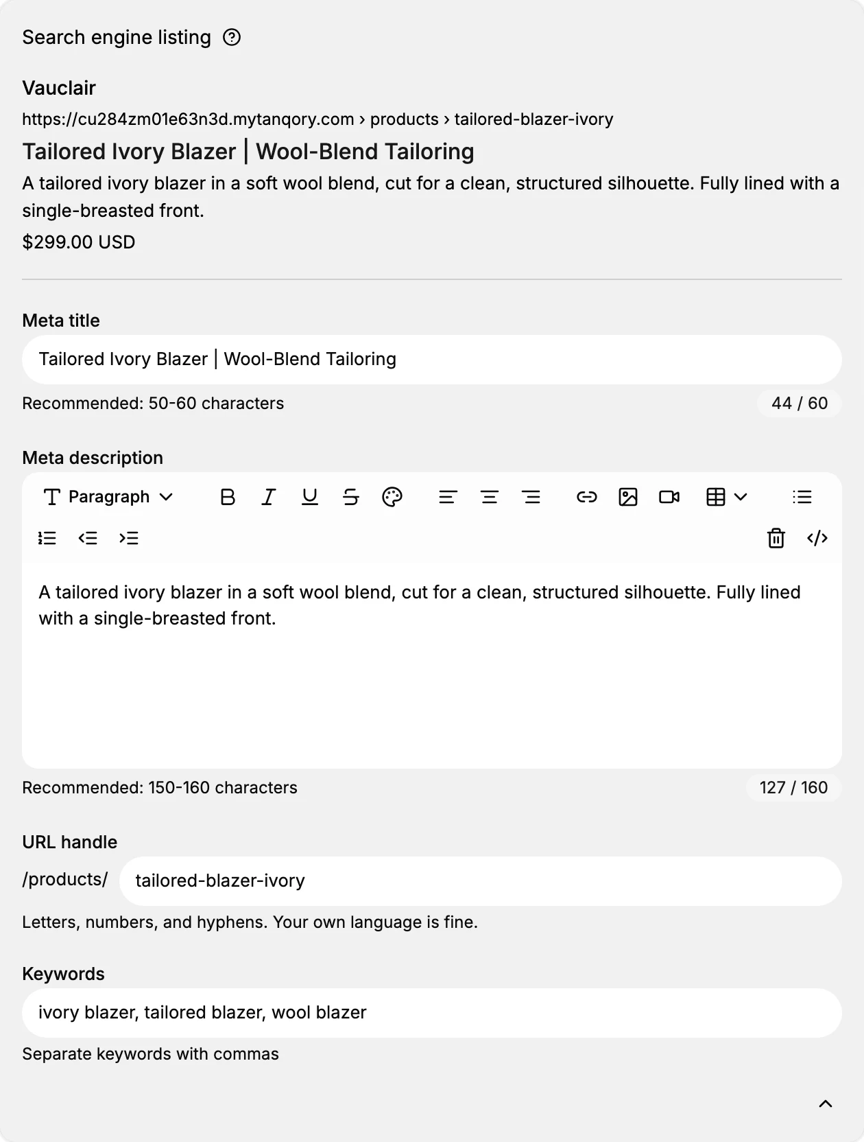 The Search engine listing section on a product, expanded. Above the fields is a search preview showing the store name, the storefront address, the product title and its description. Below it are Meta title with a 44 / 60 counter, Meta description in a rich text box with 127 / 160, URL handle after the fixed /products/ prefix with the helper Letters, numbers, and hyphens. Your own language is fine., and Keywords with the helper Separate keywords with commas.